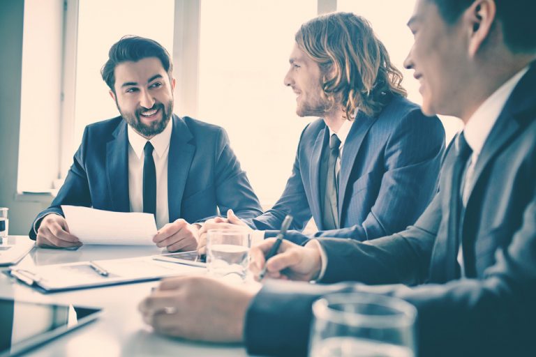 Men at meeting